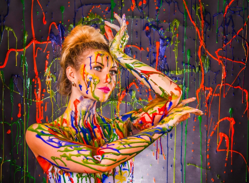 Beautiful young woman covered with paints By art_zzz